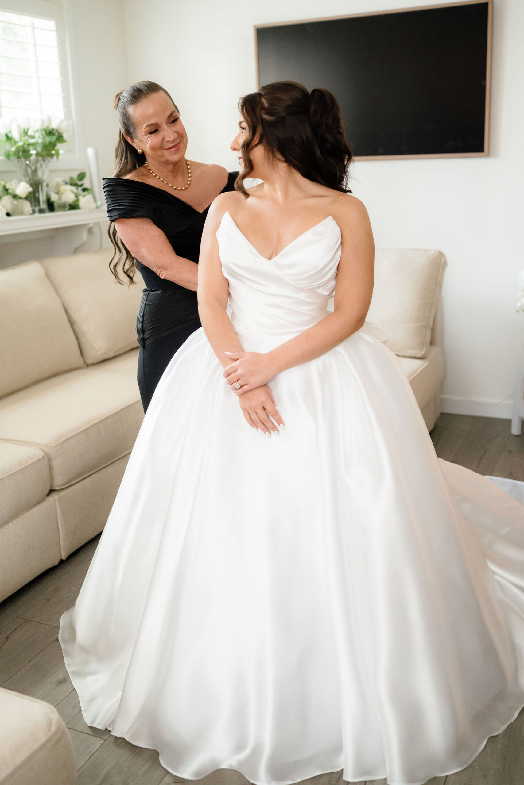 bride and mother of bride. bride getting ready